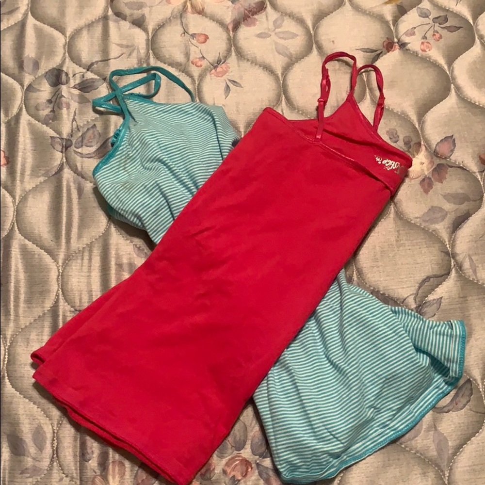 2 tank tops one pink and one blue and white